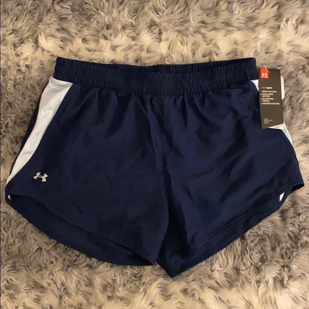 Under Armour heat gear running shorts, blue, small